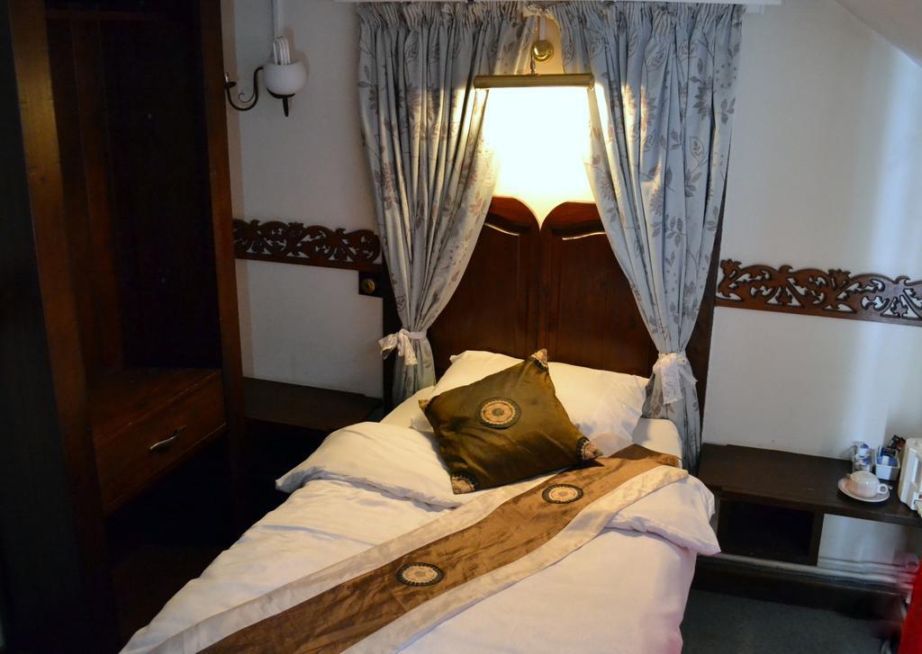 Ely Guest House Habitación foto